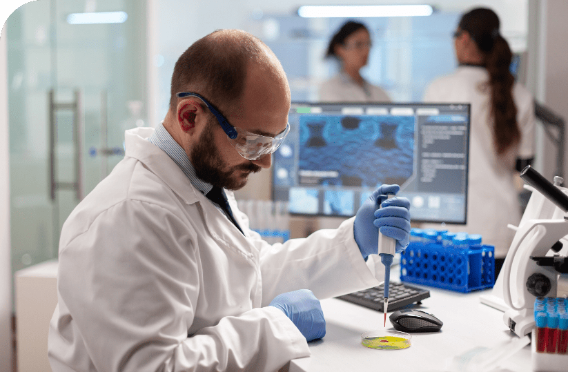 biochemistry-health-care-scientist-testing-blood-sample-using-micropipette
